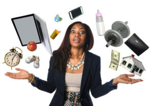 WomanJuggling Woman juggling different objects like laptop, cell phone, and barbell