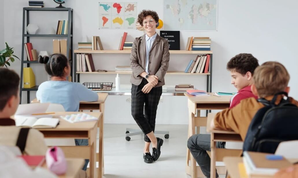 teacher smiling in keyboard