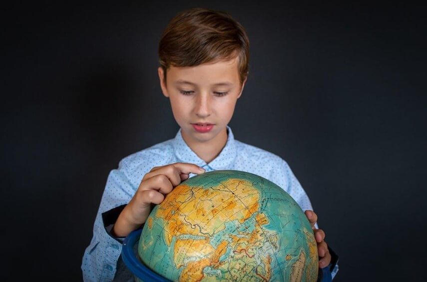 student with globe