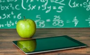 Classroom with apple on desk with ipad Classroom with apple on desk with ipad