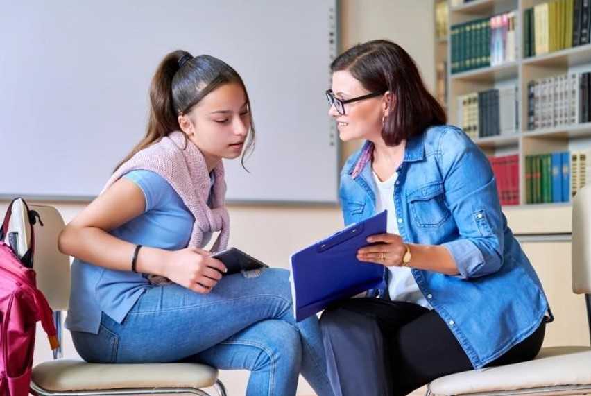 girl with her teacher